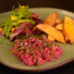 Steak Tartare with rustic potatoes and mini salad